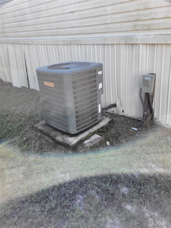 16842 Diagonal Road Hudson, FL 34667 - Photo 17 of 17 a view of a wooden door