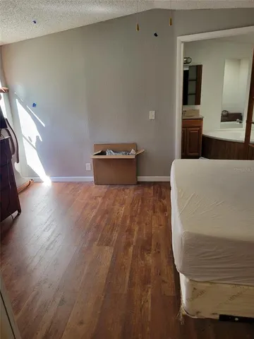 a living room with a couch and a table