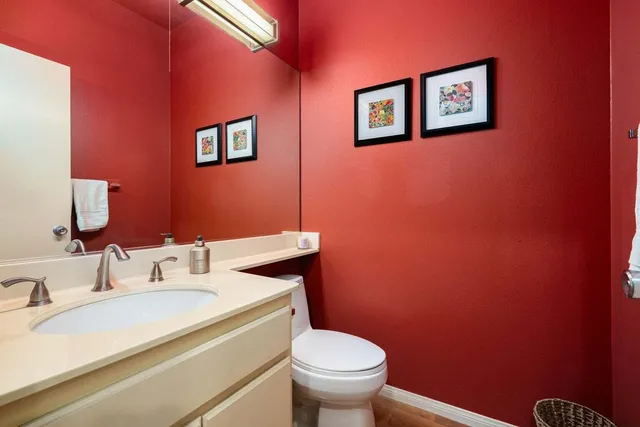 a bathroom with a sink and a toilet