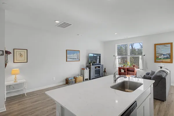 a view of a kitchen and a sink