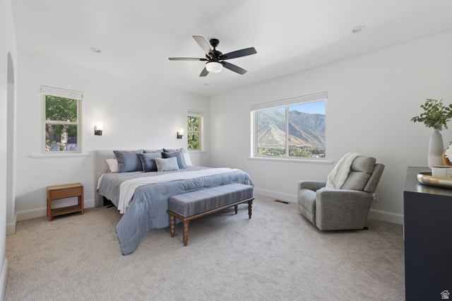 441 South 2080th Street East Springville, UT 84663 - Photo 18 of 64 Spacious bedroom featuring light neutral wall paint, recessed lighting, and a ceiling fan