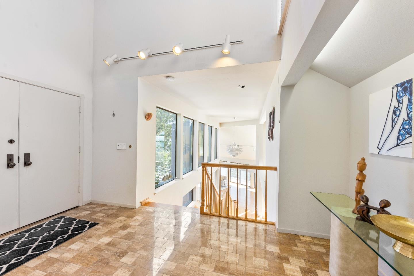 1305 Southdown Road Hillsborough, CA 94010 - Photo 12 of 72 a view of a bedroom with a bed and wooden floor