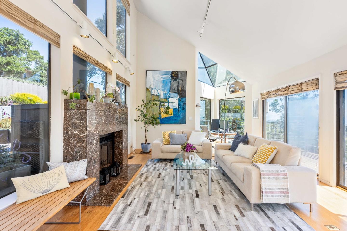 1305 Southdown Road Hillsborough, CA 94010 - Photo 16 of 72 a living room with furniture fireplace and a large window