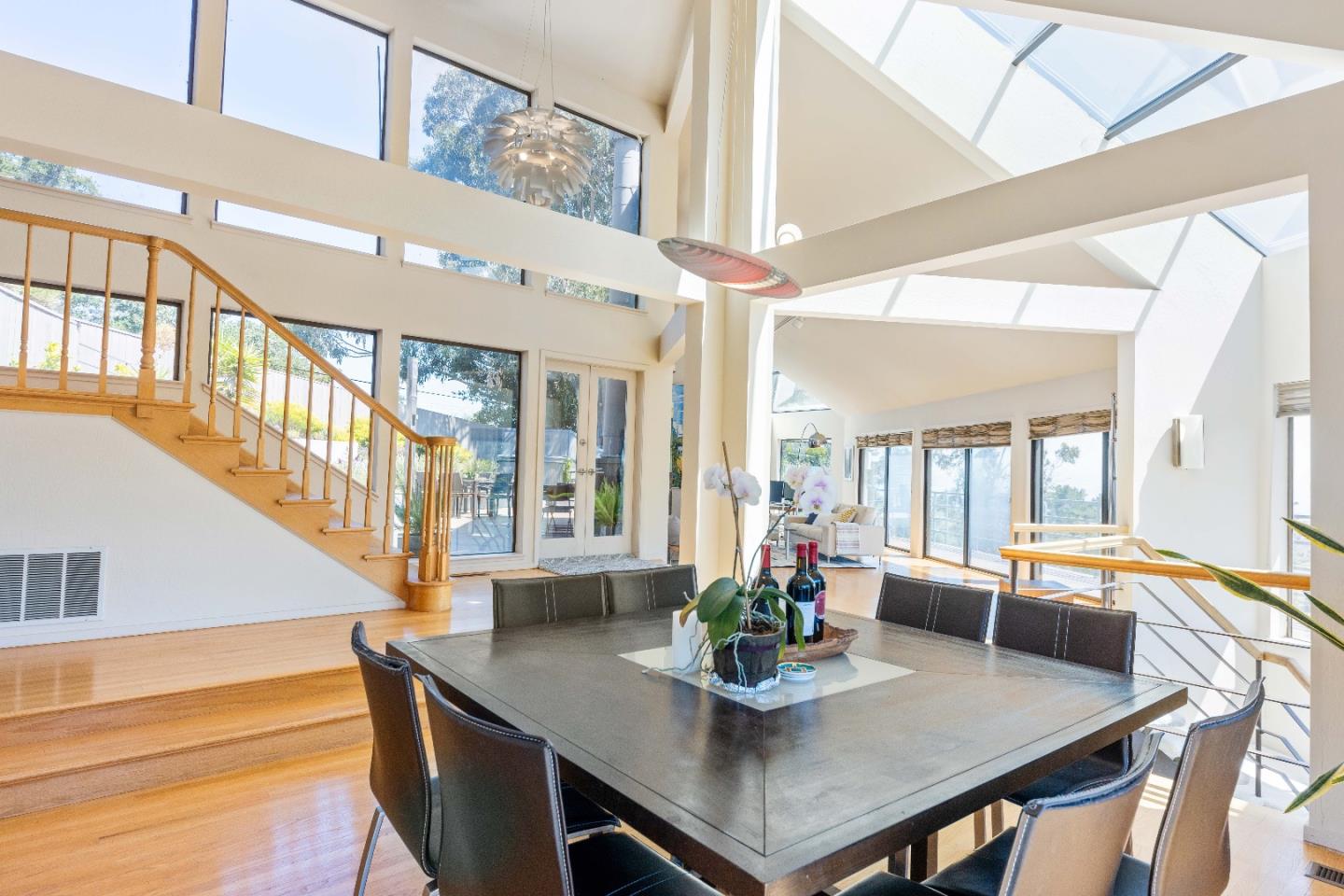 1305 Southdown Road Hillsborough, CA 94010 - Photo 18 of 72 a view of a dining room with furniture and a large window