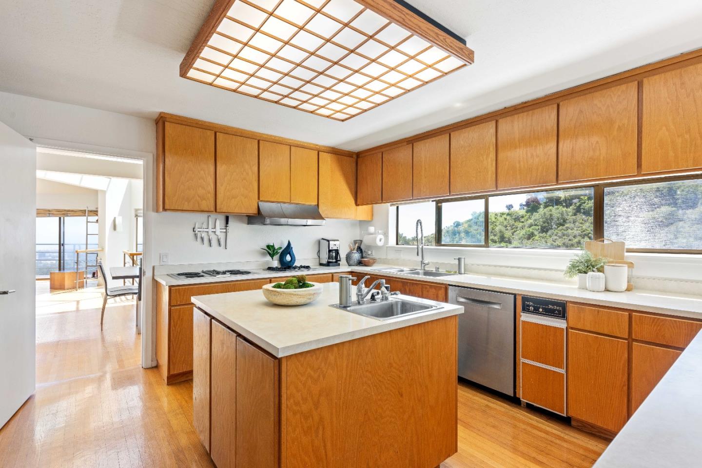 1305 Southdown Road Hillsborough, CA 94010 - Photo 25 of 72 a kitchen with stainless steel appliances granite countertop a sink and cabinets