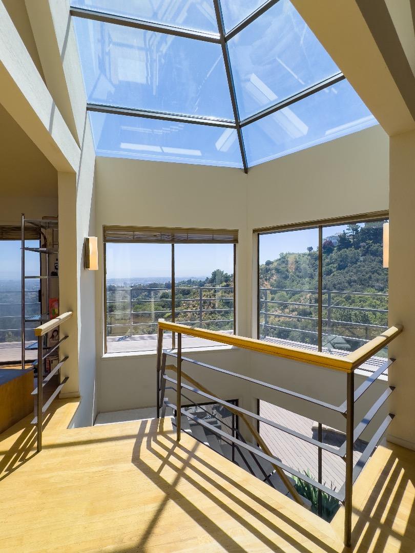 1305 Southdown Road Hillsborough, CA 94010 - Photo 27 of 72 a view of a room with gym equipment and a large window
