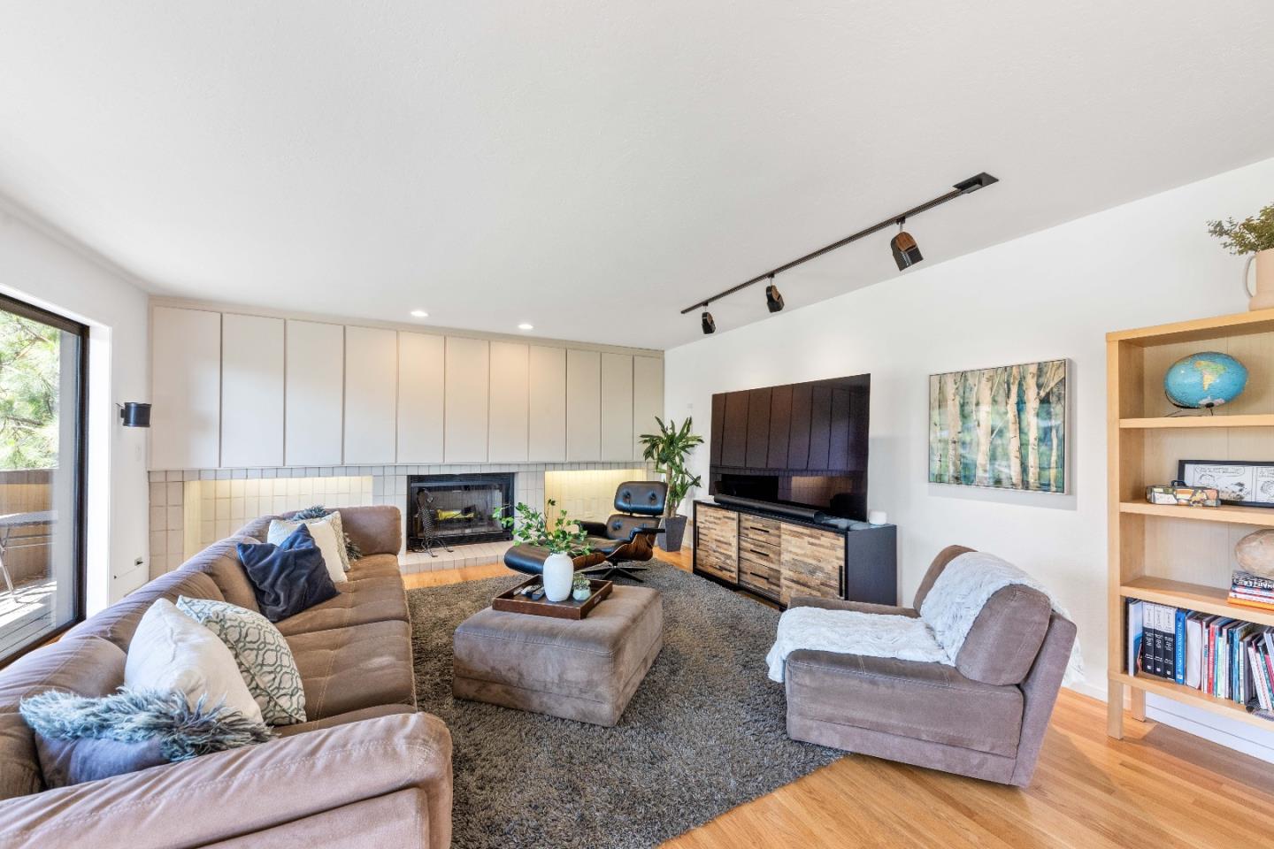 1305 Southdown Road Hillsborough, CA 94010 - Photo 32 of 72 a living room with furniture and a flat screen tv