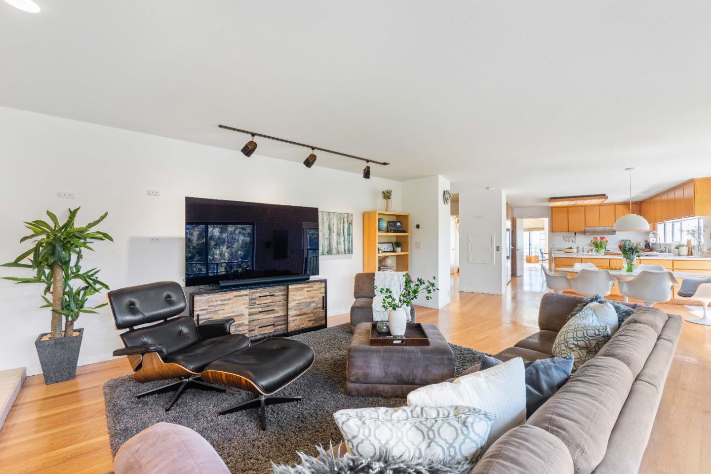1305 Southdown Road Hillsborough, CA 94010 - Photo 33 of 72 a living room with furniture and a flat screen tv