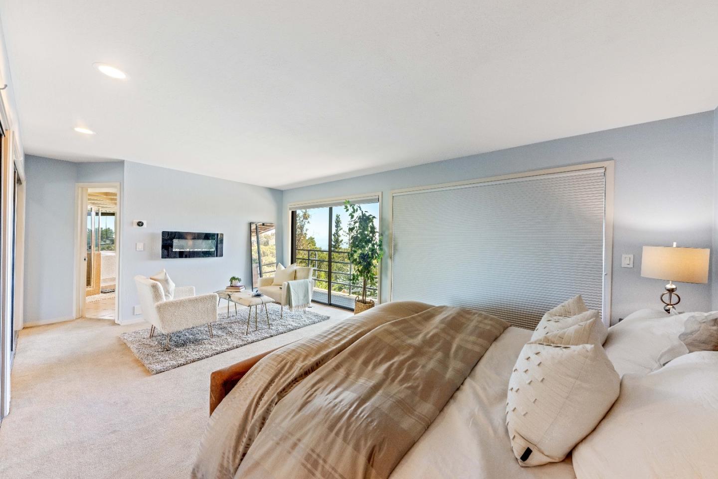 1305 Southdown Road Hillsborough, CA 94010 - Photo 35 of 72 a bedroom with a bed and a couch