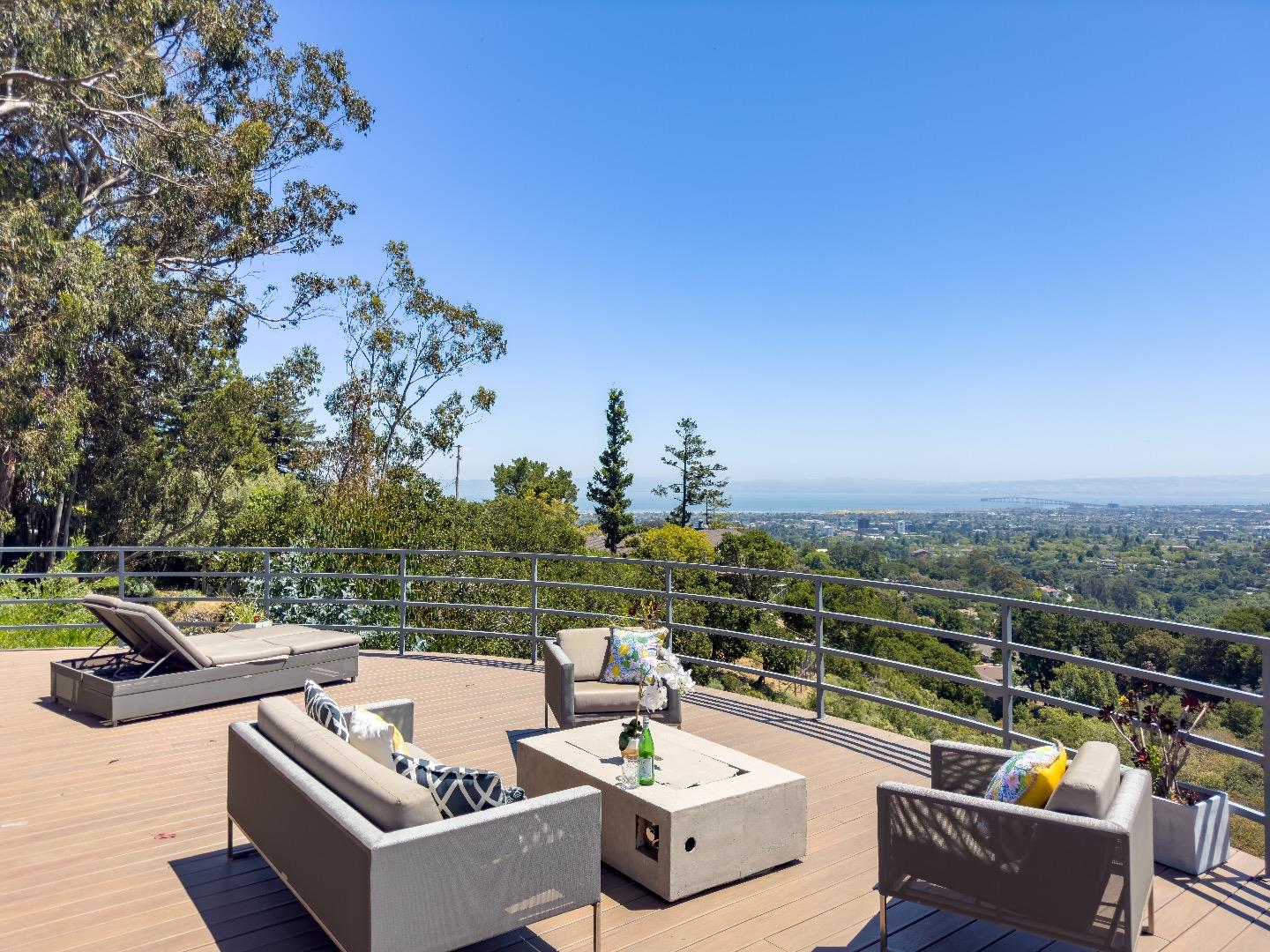 1305 Southdown Road Hillsborough, CA 94010 - Photo 48 of 72 a view of roof deck with couches and wooden floor