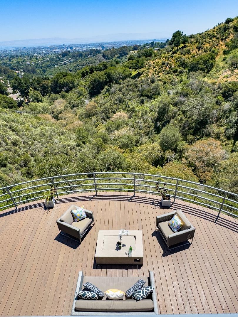 1305 Southdown Road Hillsborough, CA 94010 - Photo 49 of 72 a view of a balcony with two chairs and a table