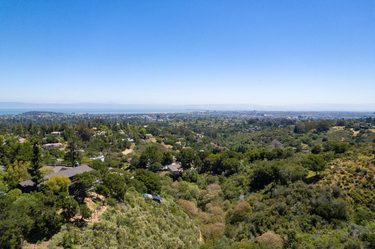 1305 Southdown Road Hillsborough, CA 94010 - Photo 5 of 72 an aerial view of house with yard and mountain view in back
