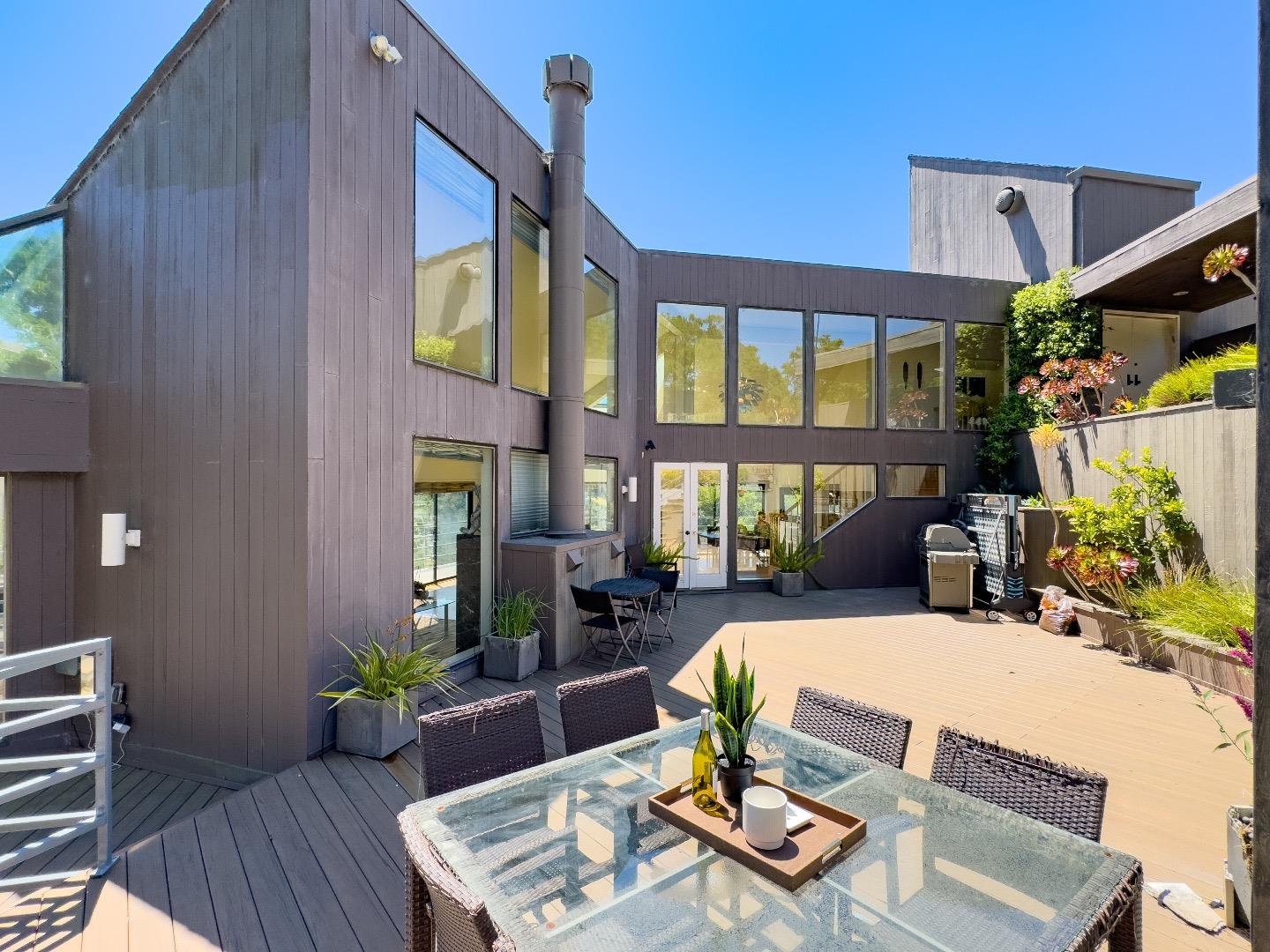 1305 Southdown Road Hillsborough, CA 94010 - Photo 58 of 72 a view of a dinning table and chairs in patio