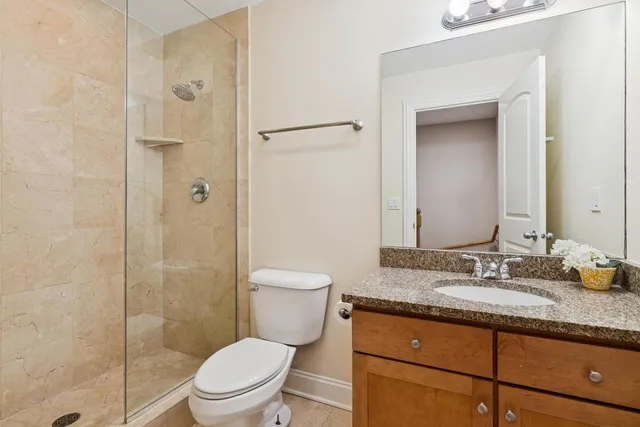 a living room with furniture wooden floor and a flat screen tv