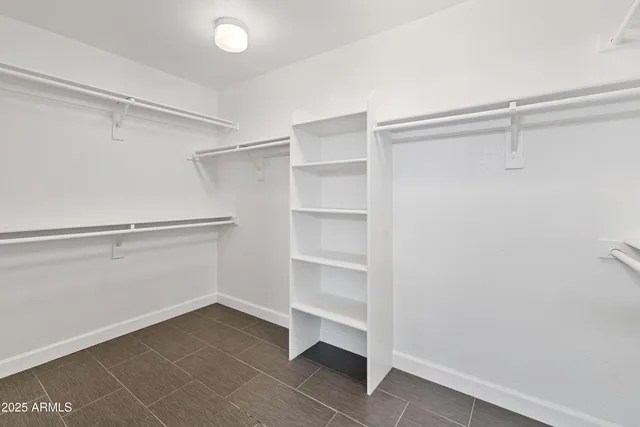 a view of an empty walk in closet