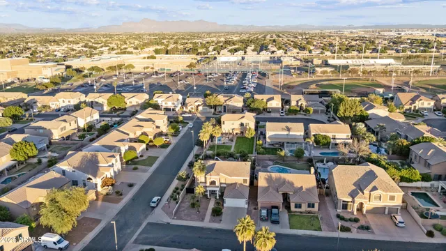 an aerial view of houses with outdoor space