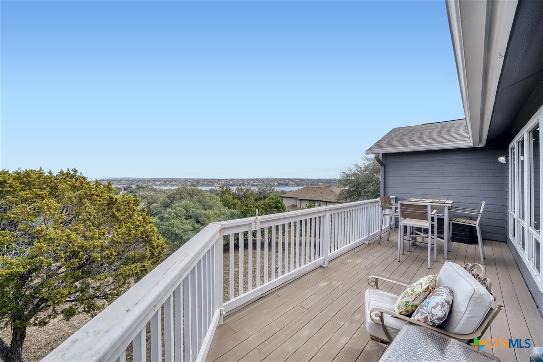 18523 Staghorn Drive Point Venture, TX 78645 - Photo 30 of 42 Living room balcony