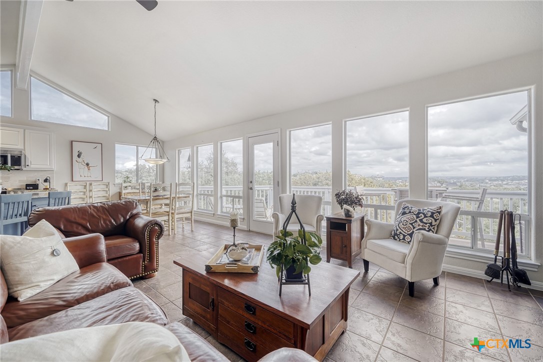 18523 Staghorn Drive Point Venture, TX 78645 - Photo 10 of 42 Living room with lake views!