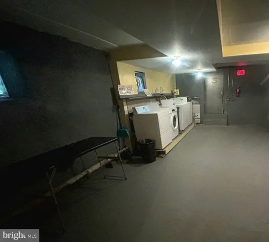 a utility room with washer and dryer