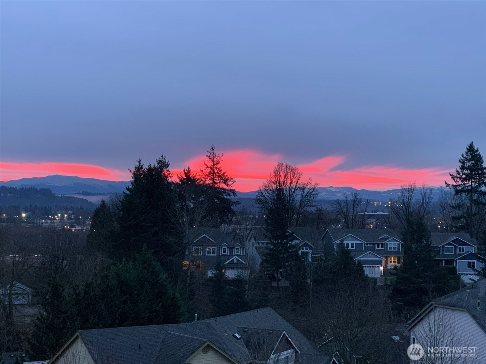 1008 R Street Northwest Auburn, WA 98001 - Photo 3 of 32 a view of a city from a balcony