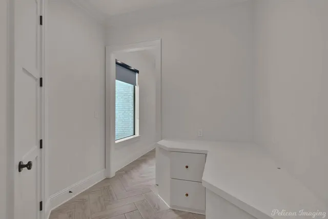 a view of an empty room and closet