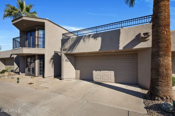 a house view with a outdoor space