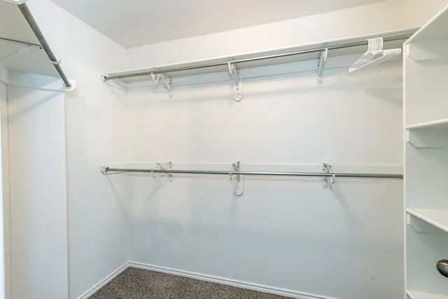 a view of a room with racks on the wall