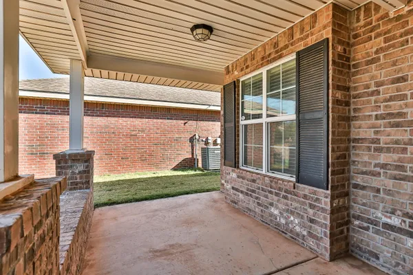 a porch with view of outdoor space