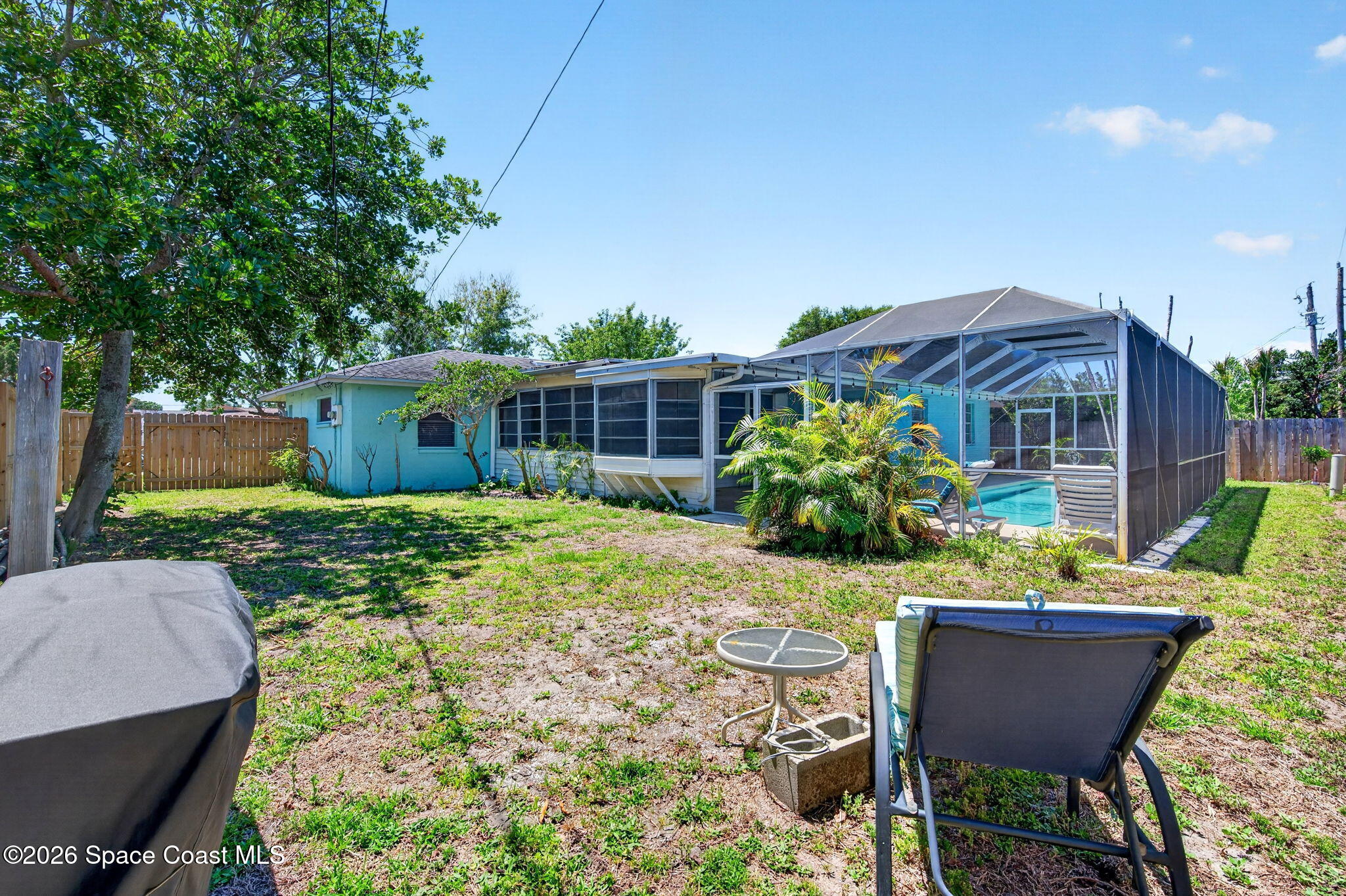 250 Perth Avenue Merritt Island, FL 32953 - Photo 29 of 32 a view of house with backyard and sitting area