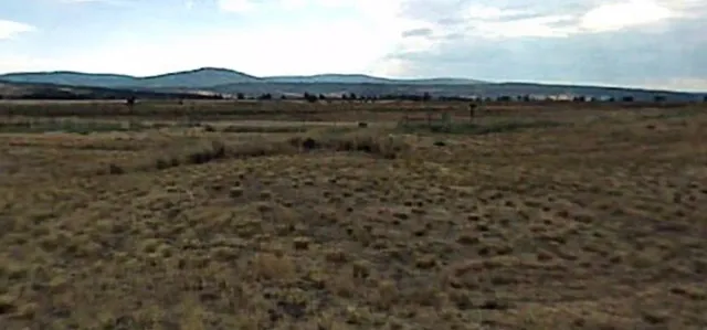 a view of mountain with lake view