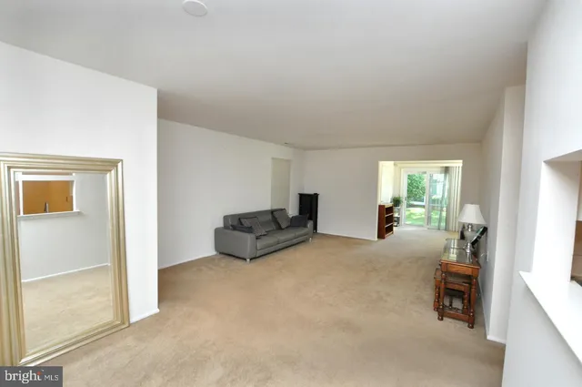 a bed room with furniture and a window