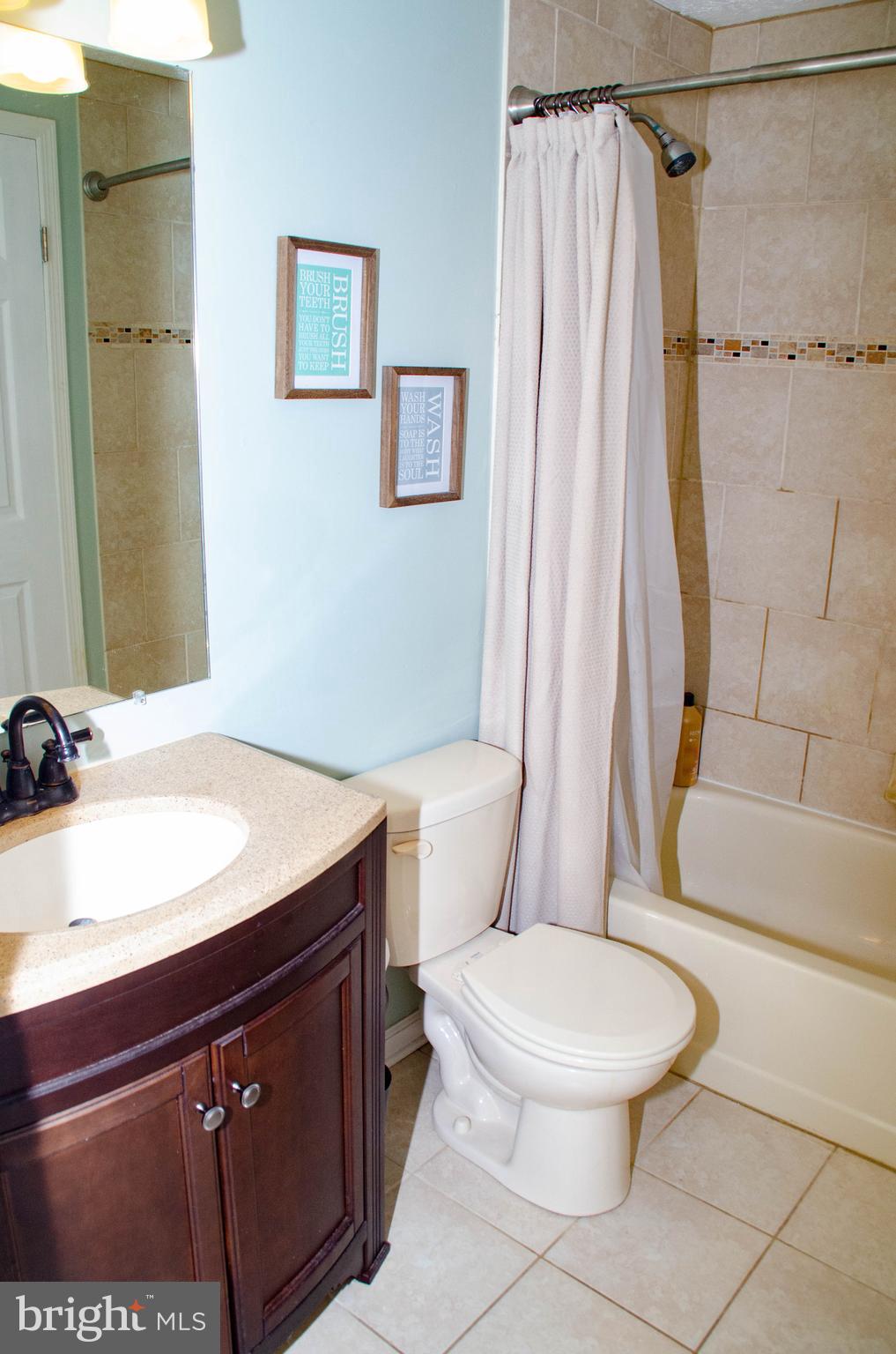 19 Trailwood Road Nottingham, MD 21236 - Photo 15 of 26 Decorative tile in shower!