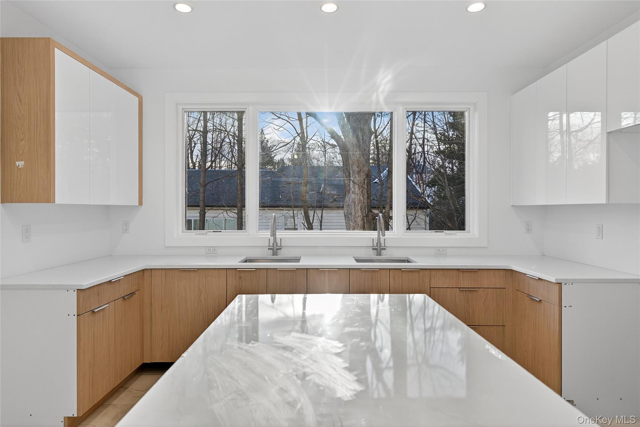 12 East Dillon Road, Unit 202 Monticello, NY 12701 - Photo 16 of 44 a view of a kitchen with a sink and cabinets