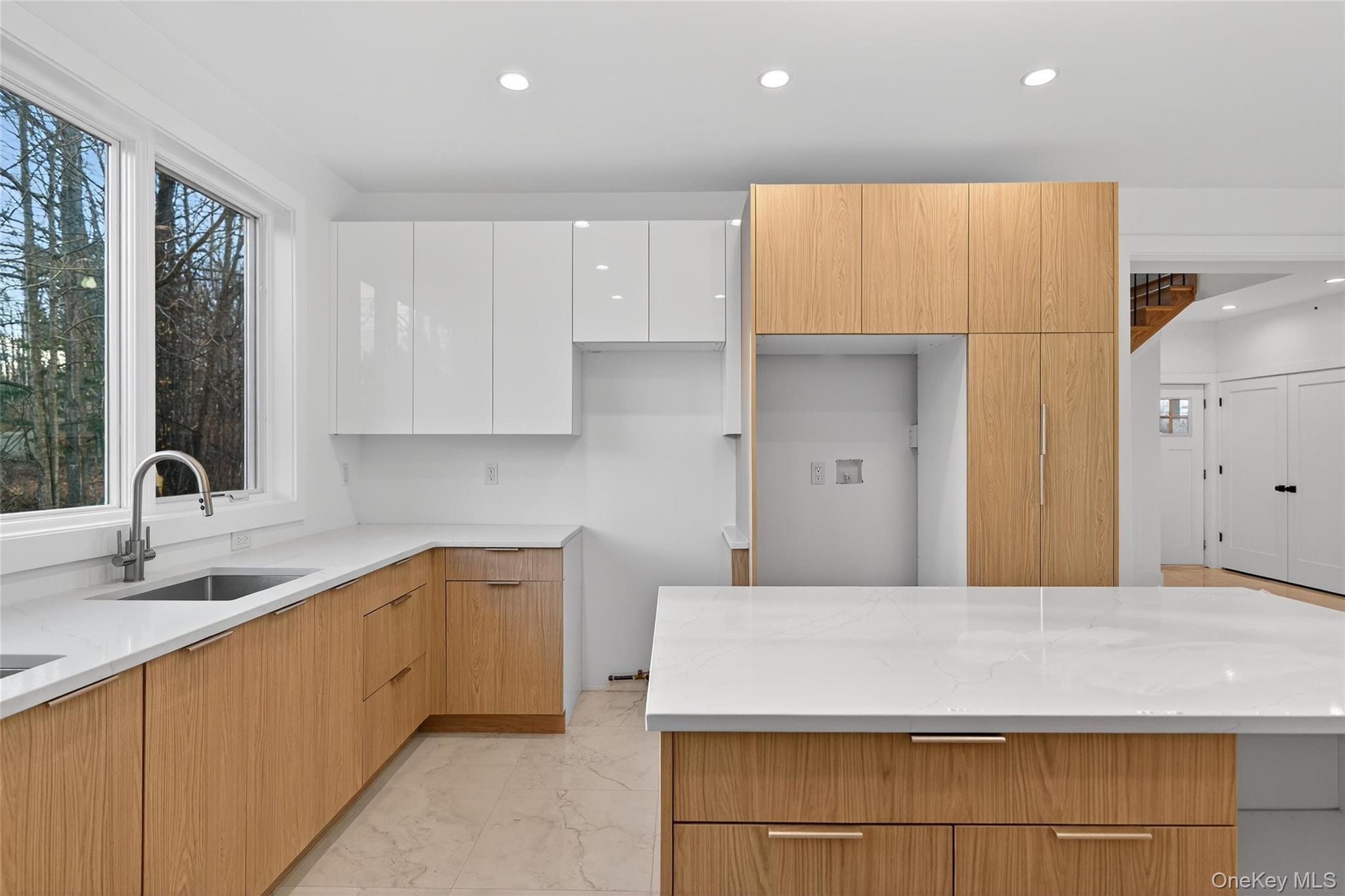 12 East Dillon Road, Unit 202 Monticello, NY 12701 - Photo 17 of 44 a kitchen with stainless steel appliances a sink stove and cabinets