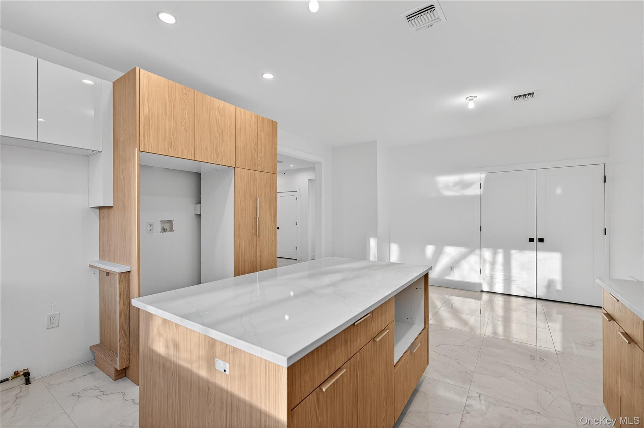 12 East Dillon Road, Unit 202 Monticello, NY 12701 - Photo 18 of 44 a kitchen with a sink cabinets and wooden floor