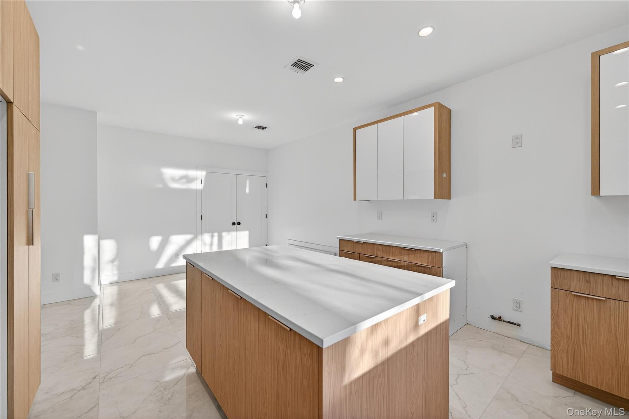 12 East Dillon Road, Unit 202 Monticello, NY 12701 - Photo 19 of 44 a hallway with washer and dryer