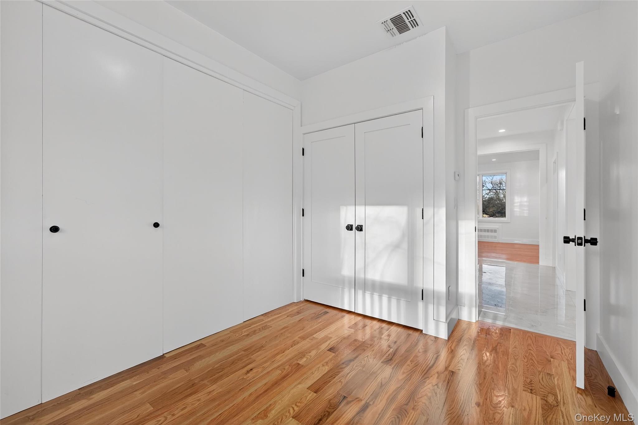 12 East Dillon Road, Unit 202 Monticello, NY 12701 - Photo 21 of 44 a view of wooden floor in an empty room