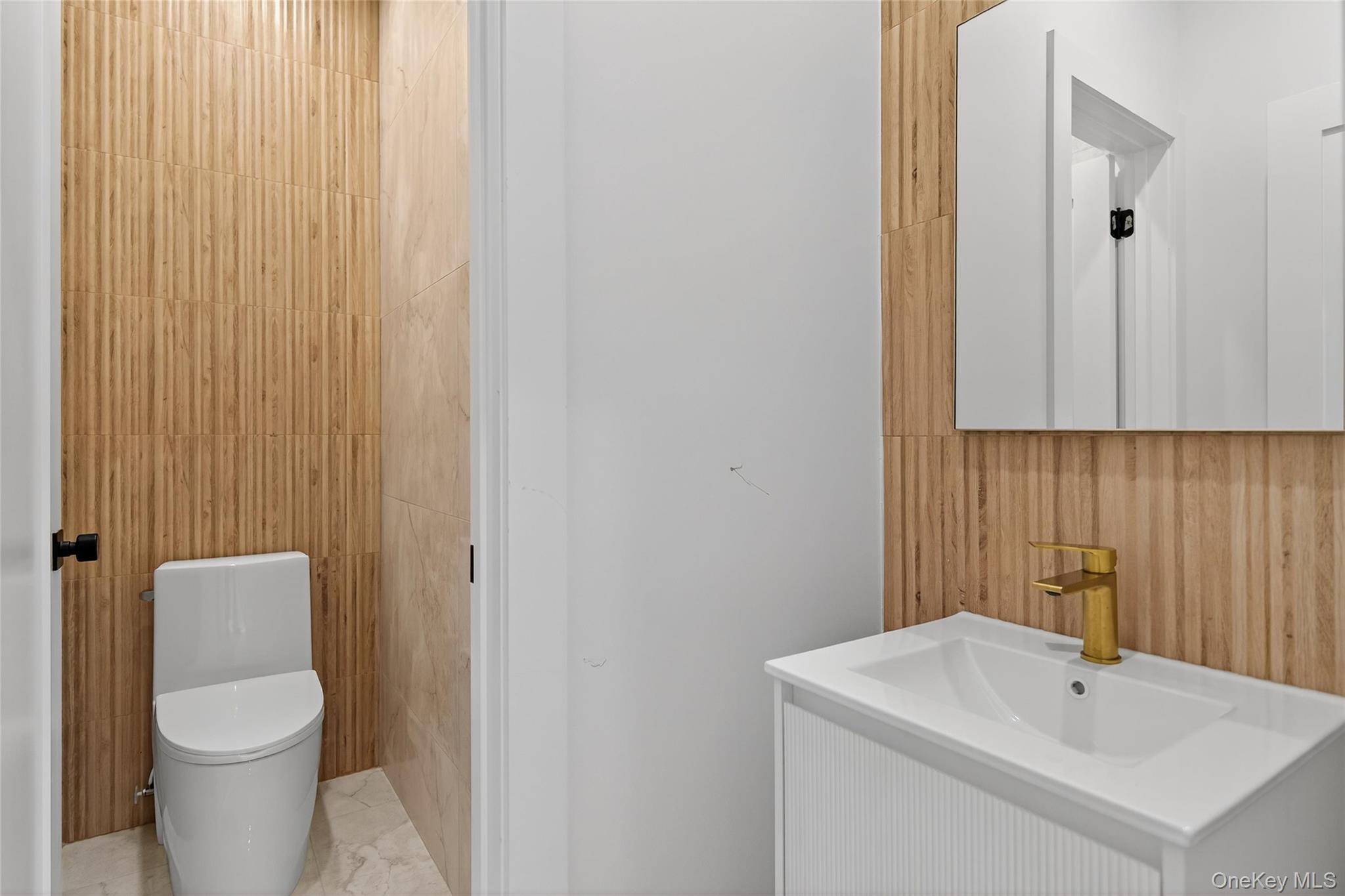 12 East Dillon Road, Unit 202 Monticello, NY 12701 - Photo 22 of 44 a bathroom with a sink a toilet and shower