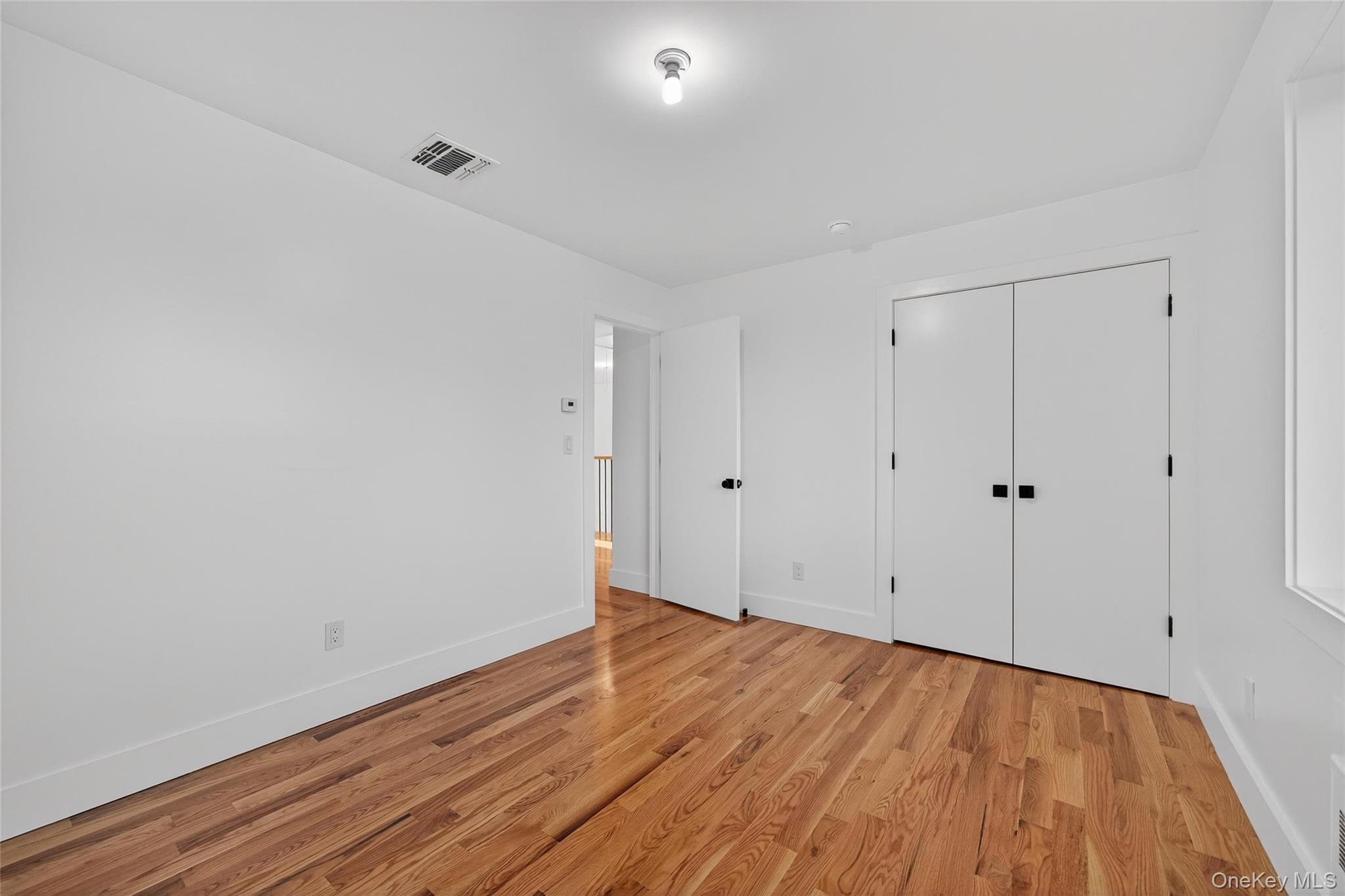 12 East Dillon Road, Unit 202 Monticello, NY 12701 - Photo 27 of 44 a view of room with wooden floor