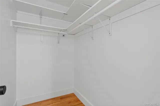 a view of a livingroom with wooden floor