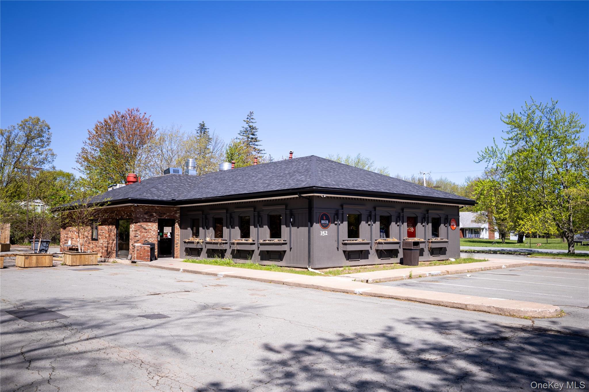 12 East Dillon Road, Unit 202 Monticello, NY 12701 - Photo 42 of 44 a view of a cafe with a patio