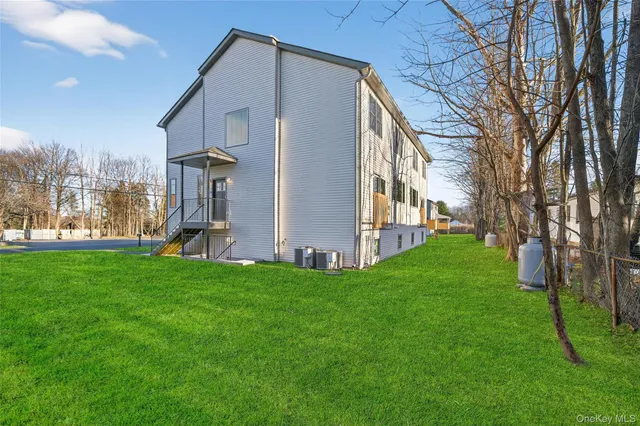 a front view of house with garden