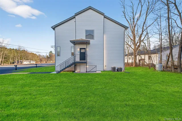 a view of staircase with white walls and white walls