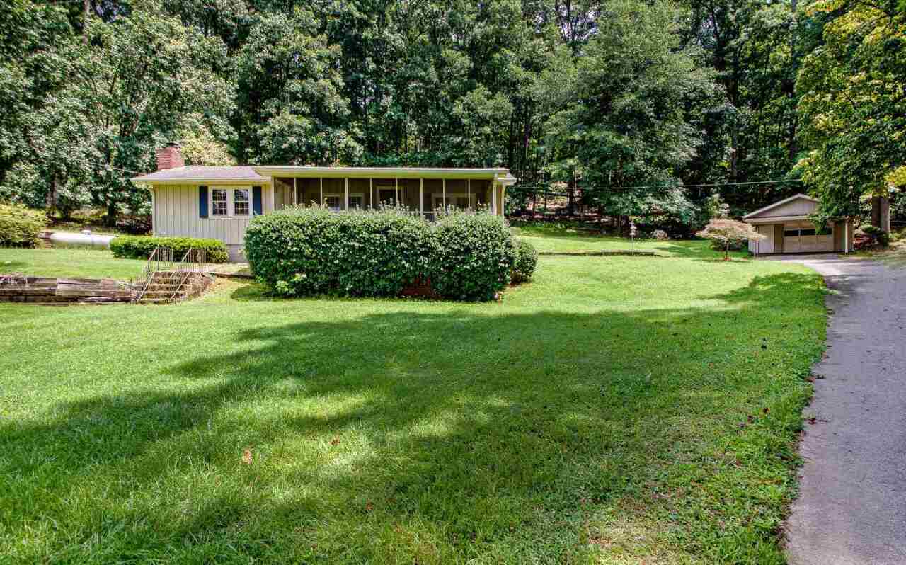7650 Rico Road, Unit 21 Chattahoochee Hills, GA 30268 - Photo 1 of 1 a view of house with backyard space and garden