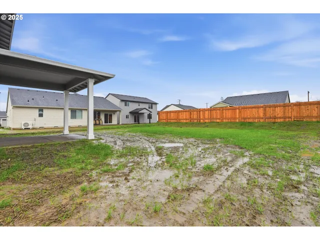 a house view with a garden space