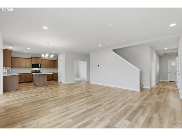 a view of kitchen with wooden floor