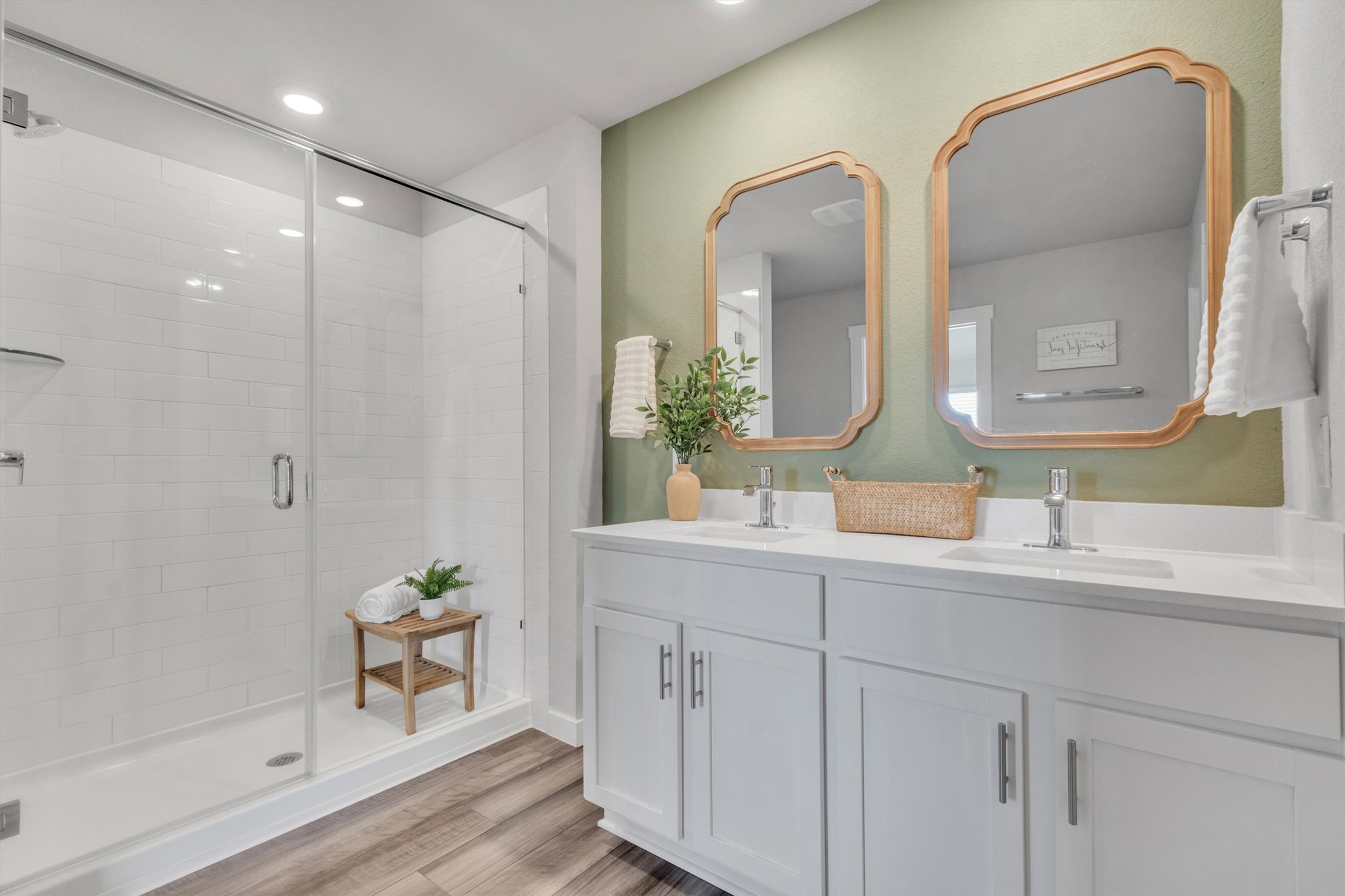 1008 Tipton Street Georgetown, TX 78633 - Photo 15 of 39 a bathroom with a granite countertop sink a mirror and a shower