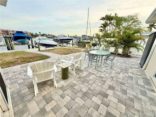 an outdoor space with furniture
