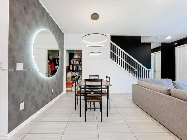 a view of a dining room with furniture