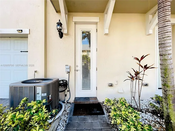 a view of a back yard of the house